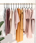 50 Pack Black Plastic Clothes Hangers For Closet Organization And Space Saving, Heavy Duty Coat Hangers For Shirts And Jackets on rail