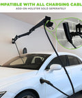 Heavy Duty Ev Cord Holder With Wall Mount Design And Adjustable Boom Arm To Tame Those Messy Level 2 Charging Cables And Keep Your Garage Floor Totally Clear In Matte Black mounted on wall with charging cable in use.