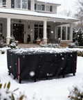 Waterproof 600D Heavy Duty Outdoor Furniture Cover for 6 To 8 Piece Patio Sets Including Sectional Sofa Chairs Ottomans and Coffee Table 111L 74W 28H Inches Black All Weather Protection in snow-covered yard