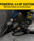 4 Gallon Wet And Dry Shop Vac With 4 Peak HP Stainless Steel Tank in use cleaning workshop floor