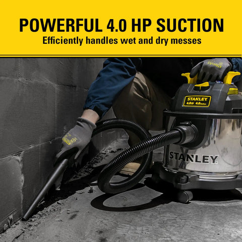 4 Gallon Wet And Dry Shop Vac With 4 Peak HP Stainless Steel Tank in use cleaning workshop floor