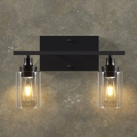 2 Light Black Industrial Bathroom Vanity Light Over Mirror Wall Sconce With Clear Glass Shades mounted on a gray wall
