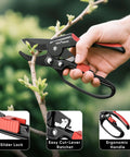 Ratchet Pruning Shears For Thick Branches, Heavy Duty Garden Clippers with ergonomic grip shown in use on a branch; slider lock, lever ratchet.