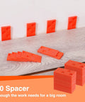 Laminate Wood Flooring Installation Kit With Reinforced Double Faced Mallet Heavy Duty Pull Bar Solid Tapping Block Foam Kneepads And 30 Piece Spacers For Quick Pro Grade DIY Ready Flooring Install showing stack of orange spacers