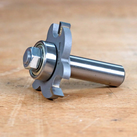 Replacement Router Bit Bearings For High RPM Performance, shown in use with metal shaft and bearing installed.