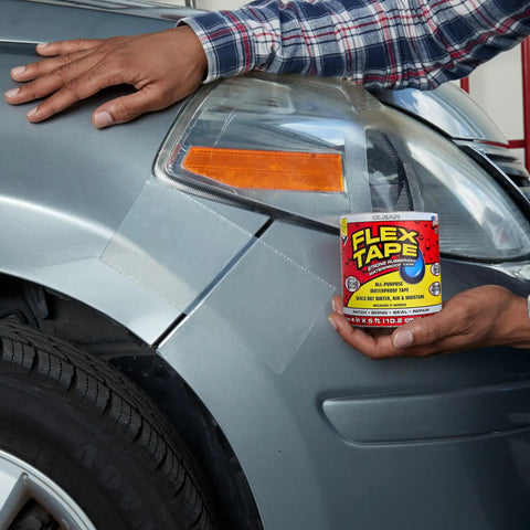 Thick Rubberized Waterproof Tape That Patches And Seals Leaks Like A Pro Anywhere Underwater Ready Indoor Outdoor Use Great For Roofs Plumbing Pools And RVs Clear 4 In By 5 Ft Pack Of 1 applied on a car panel