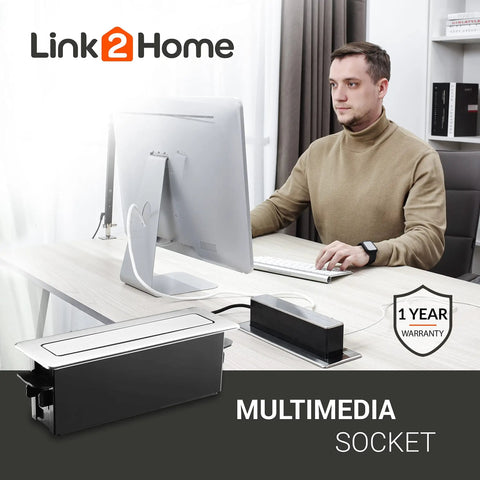 Person working at desk with Space Saver Pop Up Socket With USB And Type C Quick Charge 3 Outlets In One Concealed Receptacle.