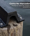 Heavy Duty Black Rubber Dock Bumper With Bolt Down Arch for piers, showing bolt-down feature on a wet wooden post.