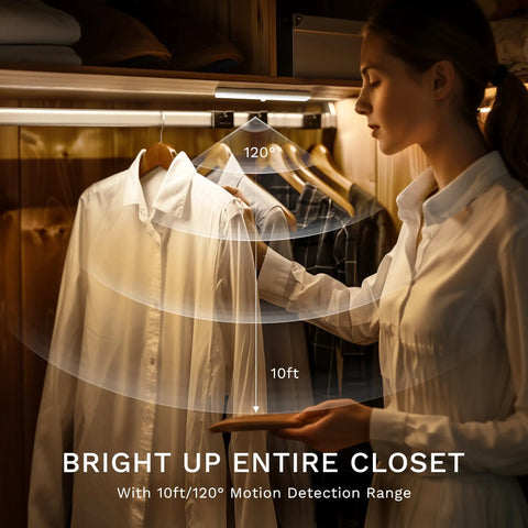 Woman using 6 Pack Motion Sensor Lights For Closets And Stairs, 10 LED Battery Operated Night Lights with 120-degree detection
