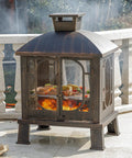 45 Inch High Metal Chiminea Fire Pit With Grill 2 In 1 Bonfire And BBQ Outdoor Wood Burning Fireplace for garden or patio, black and gold.