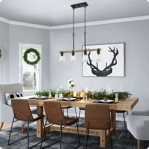 Asher 34-Inch 4-Light Farmhouse Kitchen Island Light With Funnel Glass Shades hanging over a dining table in a modern room.