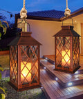 14 Inch Solar Lanterns Outdoor Garden Lights Weatherproof Waterproof LED Flickering Flameless Candles on patio at dusk