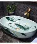 Super Chic Oval Above Counter Bathroom Vanity Vessel Sink Premium Porcelain Ceramic Washbasin with floral design, size 57x39 cm.