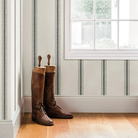 Black Fabric Stripe Wallpaper With Woven Look Prepasted And Washable Strippable Finish in room setting with boots