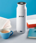 Travel Stainless Steel Electric Kettle 450ml With Temperature Control LED Auto Shutoff for coffee on desk with books and cup