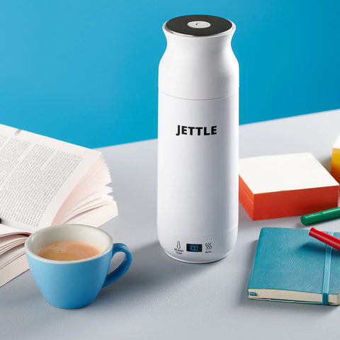Travel Stainless Steel Electric Kettle 450ml With Temperature Control LED Auto Shutoff for coffee on desk with books and cup