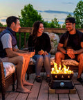 Group enjoying outdoor evening with Firecube 14 Inch Portable Smokeless Propane Fire Pit With Carry Kit And Lava Rocks, 58,000 BTU, Black.