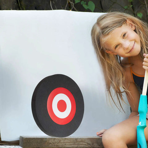 Child near Round EVA Foam Arrow Target For Archery Training, Portable Backyard And Indoor Outdoor Practice Target, Lightweight