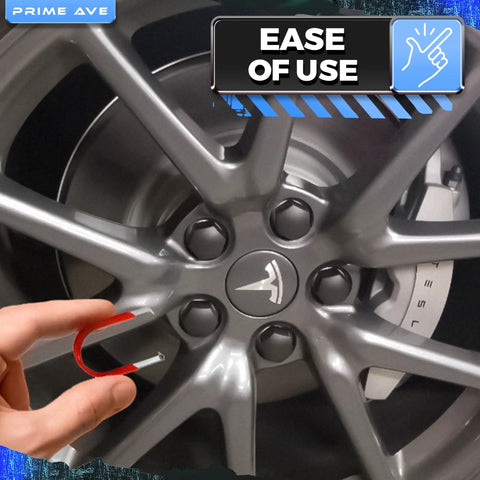 Using Three Piece Lug Nut Cap Cover And Center Cap Removal Tool Set With Stainless Steel Plastic ABS And Steel Pullers For Audi BMW Mercedes Mini Tesla VW Cars on a Tesla wheel.