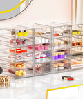 Real Talk No Fuss Clutter Crusher Game Changer Vanity Setup Easy Glide Bins with clear acrylic holders storing cosmetics.