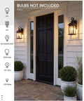 Two Pack Outdoor Wall Sconces, Waterproof Exterior Porch Lanterns With E26 Socket, Anti Rust Matte Black Finish And Seeded Glass Lampshade lighting a black door entryway