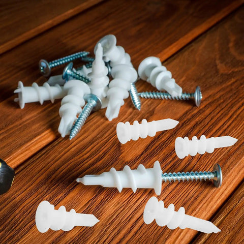 300 Piece Multi Function Heavy Duty Drywall Anchors Kit With POM Material on wooden surface