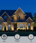 Brick house illuminated at night with 8 Pack Dimmable LED Landscape Lights, 12V Low Voltage, 5CCT 1800K to 5000K, Wall Wash Outdoor Spotlight.