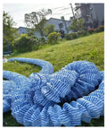 Two To Four Inch Corrugated Perforated French Drain Pipe With Nonwoven Polyester Filtration Layer on lawn landscape.