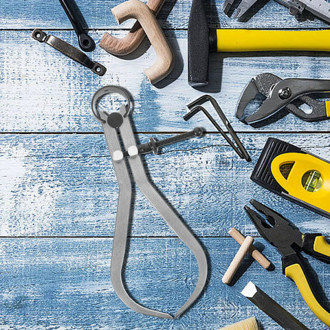 Built Tough Carbon Steel Caliper Kit For Hella Accurate Woodturning placed on a wooden workbench with tools around.