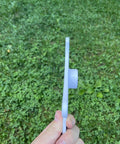 Side view of end connector from Adjustable Dog Agility Cavaletti Jump Set Of 4 For Backyard Training And Rehab on grass field.