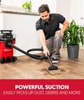 Compact 4 Gallon Wet Dry Shop Vac With 3.5 Peak Hp Motor and Kickin Suction for Garage Cleanups, used for cleaning debris.