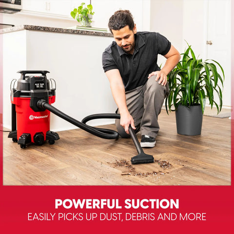 Compact 4 Gallon Wet Dry Shop Vac With 3.5 Peak Hp Motor and Kickin Suction for Garage Cleanups, used for cleaning debris.