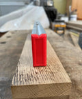 Built Tough 12 Inch Magnetic Toolbox Level With Aluminum Frame end view on wooden plank