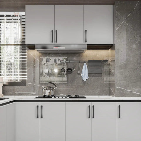 Modern kitchen featuring Kickass Five Inch Matte Black Kitchen Cabinet Handles Ten Pack on sleek white cabinets.