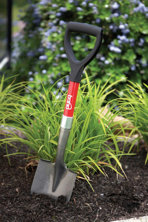 Mini D Handle Shovel For Garden Camping Beach And Outdoor Adventures with non-slip grip in a garden setting
