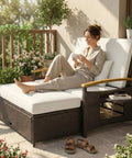 Woman relaxing on Rattan Outdoor Daybed With Storage Ottoman And Four In One Functionality Adjustable Backrest In Four Positions