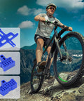 Cyclist rides mountain bike with images of 8 Piece Bike Hydraulic Disc Brake Bleed Blocks And Spacers Kit in top left.