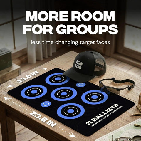 Reusable Self Healing Rubber Archery Target Face Roll Up Practice Target Sheet With Bright Bullseyes on table with gear