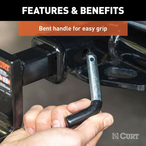 Trailer Hitch Pin And Clip With Vinyl Coated Grip Half Inch Diameter Fits One And One Quarter Inch Receiver Zinc Clear Finish Comfortable Grip For Easy Handling Versatile Tow Accessory For Ball Mounts And Trailer Hitches Durable And Secure image showing a hand gripping the pin.