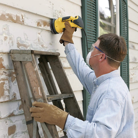 Person using PaintEater Electric Palm Grip Paint Removal Sander Kit For Easy Paint Stripping on wood siding, 4-1/2 inch disc