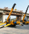 Portable Mini Crawler Crane With Wireless Handheld Transmitter And Dependable Hydraulic Pump built tough for tight quarters on construction site.