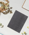 Pearl Cotton Foam Sheets 2 Pack Ultra Tear Resistant Soft Cushioned Pads on crafting table with flowers and rope