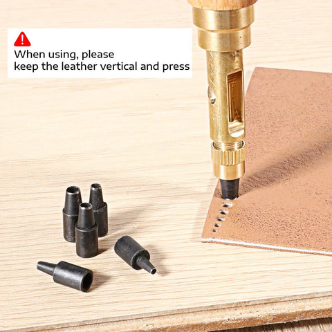 Slick Wooden Handle Bookbinding Tool With Six Interchangeable Tips Adjustable Leather Hole Punch in use on leather for stitching.