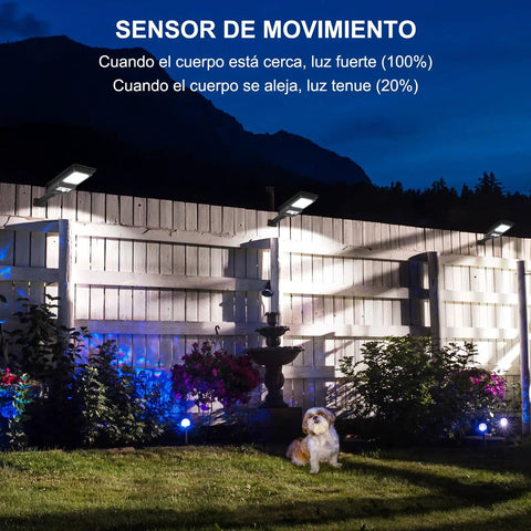 Night garden fence lit by Outdoor Solar Lights 1000 Lumens 156 LED Solar Powered Motion Sensor Flood Lights with a dog.