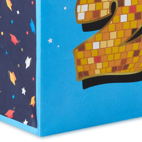 Close-up of Medium Year Dated Graduation Gift Bag With Tissue Paper Blue Gift Bag Featuring Class of 2026 With Gold Disco Ball