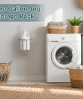 Heavy Duty Iron Wall Mounted Gallon Jug Holder 2-Pack in laundry room next to washing machine, holding a white gallon bottle.
