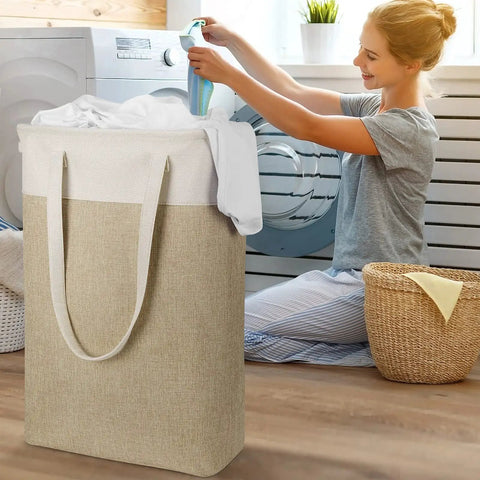 Woman using Two-Pack Slim Laundry Hampers Set In Beige And Khaki, Collapsible Linen-Like Fabric Baskets for Clothes