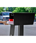Street Safe Locking Mailbox With Rear Access Door For Safe Mail And Parcels, shown in use on a curbside with mail retrieval