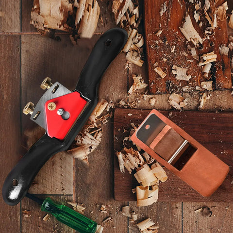 Rock Solid Adjustable Spokeshave Set With Six Precision Blades And Portable Woodworking Plane alongside wood shavings and tools.