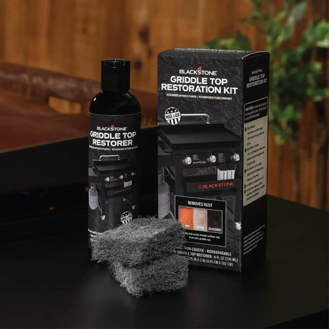 Blackstone Griddle Top Restoration Kit Includes 8 Oz Griddle Top Restorer And Two Heavy Duty Scrub Pads For Quick Griddle Cleanup And Easy Maintenance On Griddle Plates Side Shelves Cookware And Tools, bottle and box